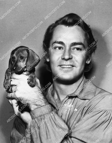 Alan Ladd posing w his new puppy dog 1813-27