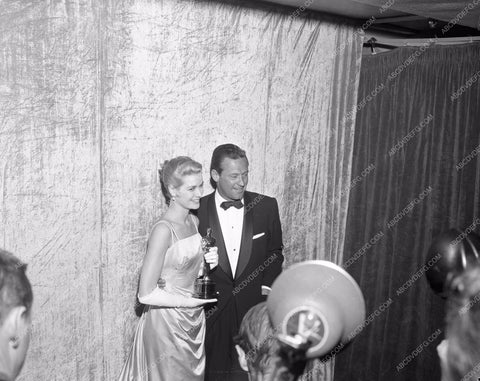 1954 Oscars Grace Kelly William Holden candid Academy Awards aa1954-40</br>Los Angeles Newspaper press pit reprints from original 4x5 negatives for Academy Awards.