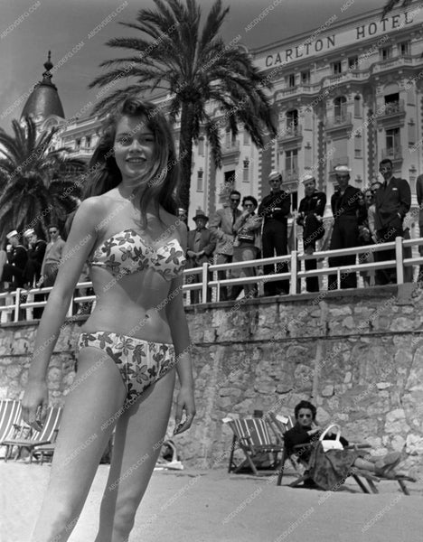 onlookers watch Brigitte Bardot bikini beach photo shoot