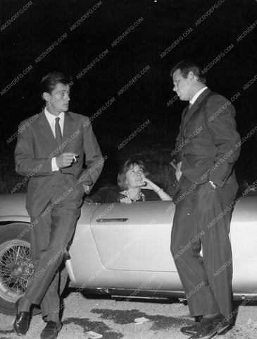 Alain Delon enjoys a cigarette with friends 8b20-1828