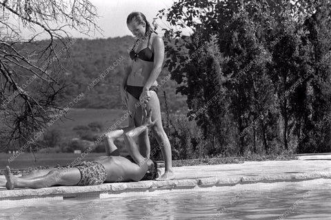 Alain Delon clowning by the pool enjoying the view 8b20-3638