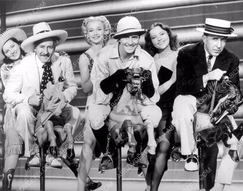 Adolphe Menjou Carole Landis Richard Arlen maybe on rocking horses 8b20-5919