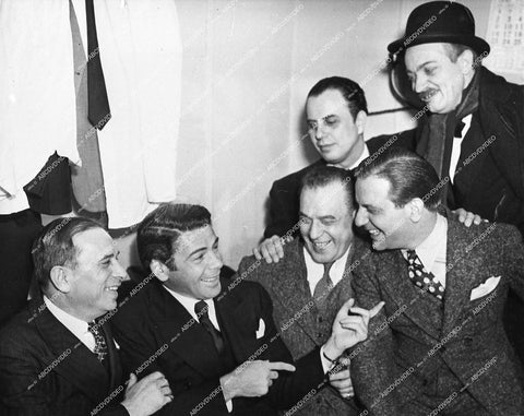 Paul Muni laughing it up with others - 0428-036