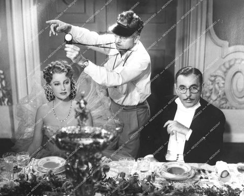 Jeanette MacDonald, Douglass Dumbrille behind the scenes with light meter man - 1942 film I Married an Angel - 0456-025