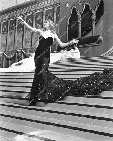 shapely Ilona Massey in elegant black gown - 1937 film Rosalie - 0457-002