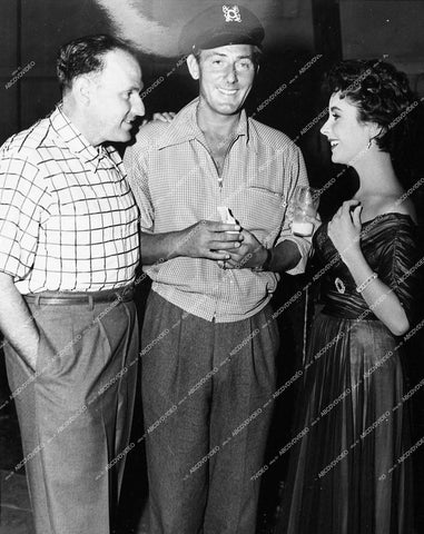 Elizabeth Taylor and husband Michael Wilding with some director maybe - 0458-017
