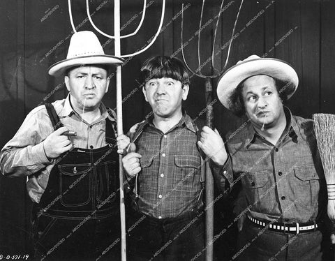 3 Stooges Moe Howard, Curly Howard, Larry Fine - 1944 short subject film The Yoke's on Me - 0458-031