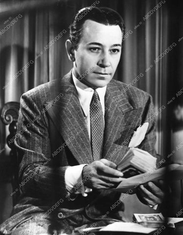 George Raft counting the money film Invisible Stripes 475-21