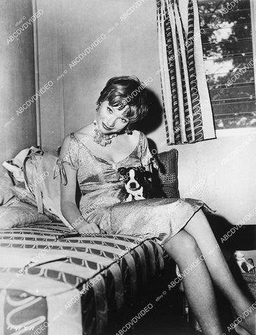 candid Shirley MacLaine w her dog in her dressing room film Some Came Running - 11004-004