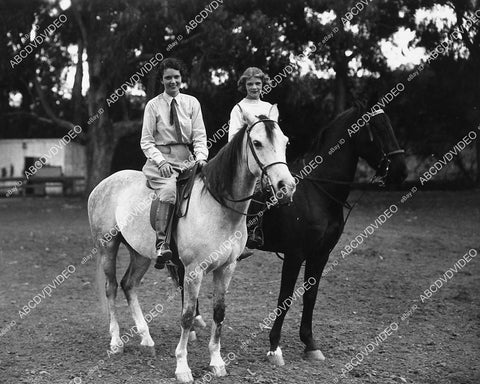 candid Elissa Landi & Margaret Churchill on horseback - 11011-014