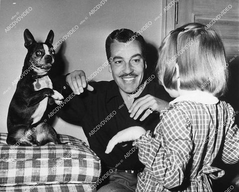 great candid Cesar Romero w his pug bull dog and little girl - 11024-035