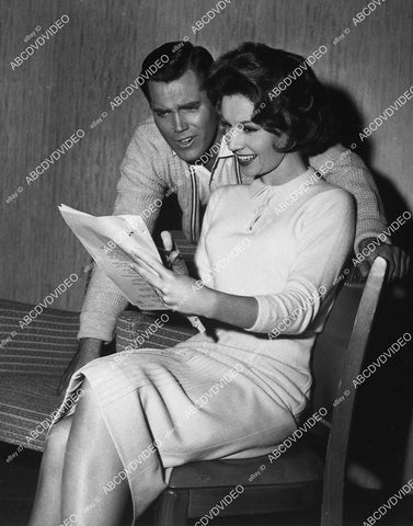 candid Jeffrey Hunter & Pat Crowley go over the script - 11028-023