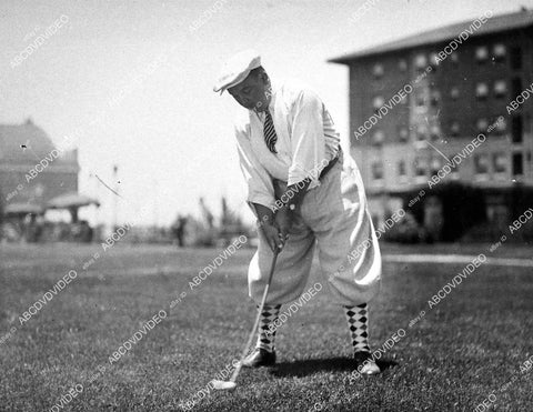candid Bert Roach working on his golf swing - 11030-006