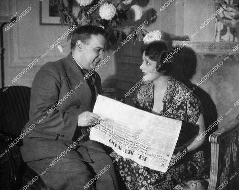 candid Irene Rich and friend w newspaper - 11031-033