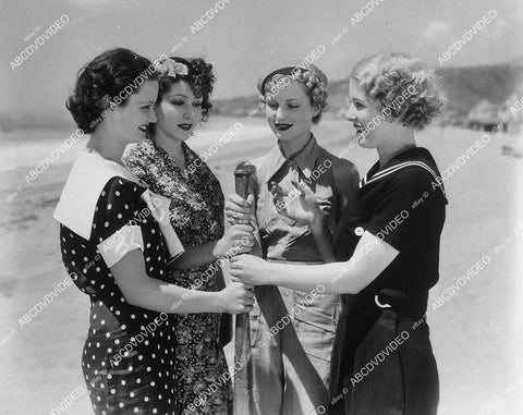 candid June Lang, Blanca Vischer, Rosina Lawrence, Ruth Peterson play baseball on Malibu Beach - 11042-035