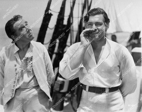 candid Charles Laughton & Clark Gable on ship's deck film Mutiny on the Bounty - 11045-005