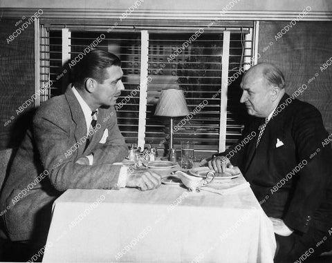 candid Clark Gable w Canadian Nat Railways pres R.C. Vaughan film The Hucksters - 11045-006
