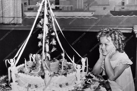 candid Shirley Temple admires her Birthday Cake 173-13