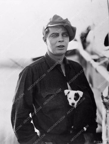 candid Hoot Gibson w puppy dog tucked in his shirt film The Fire Eater 330-07