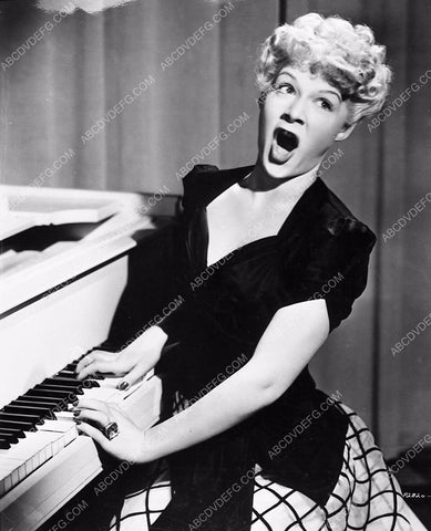 Betty Hutton singing away at the piano film The Fleet's In 338-36