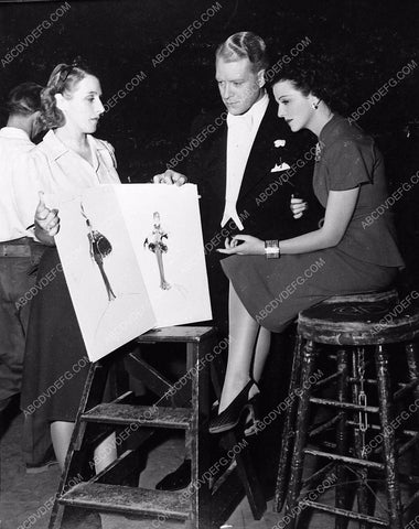 candid Nelson Eddy Binnie Barnes look at wardrobe sketches I Married Angel 360-24