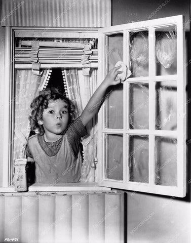 Shirley Temple plays in her custom doll house at Fox Studios 563-06