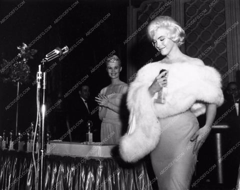 candid Marilyn Monroe receiving an award on stage 655-10