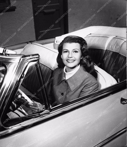 Rita Hayworth pulls into Columbia Studios in her new car automobile 735-19