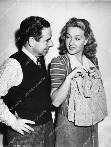 candid Bonita Granville and a Universal director I think on set 739-32