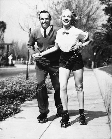 candid Jackie Coogan Betty Grable go for a roller skate ride 745-15