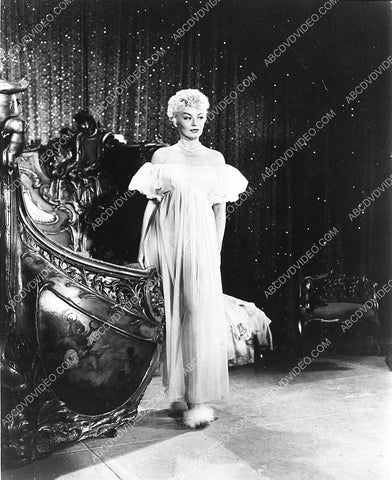 Burlesque stripper Lili St. Cyr laying in sheer lingerie live show 798-07