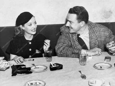 candid photo Bette Davis & orchestra big band leader Glen Gray dining out 842-17