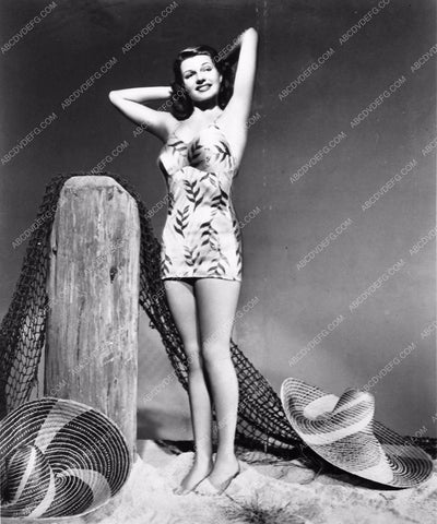 leggy Rita Hayworth in swimsuit filom You'll Never Get Rich 856-26