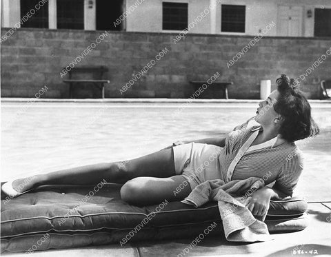 Judy Garland laying out in the sun film A Star Is Born 883-36