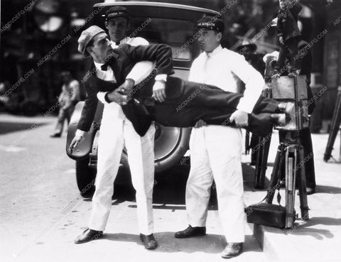 Buster Keaton "The Camerman" behind the car 919-08