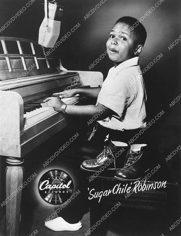 music young black kid Sugar Chile Robinson at the piano 967-33