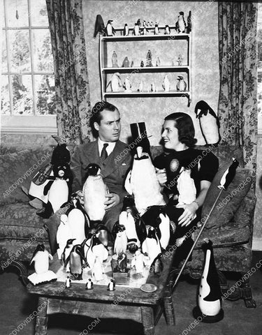 candid Russell Gleason w wife Cynthia Lindsay and a bunch of toy penguins 970-13