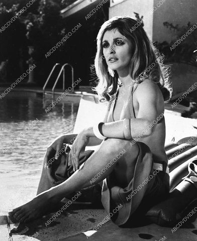 Sharon Tate sitting poolside 987-12