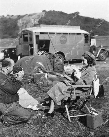 candid Maureen O'Sullivan on location w Columbia Studios truck in background 988-21