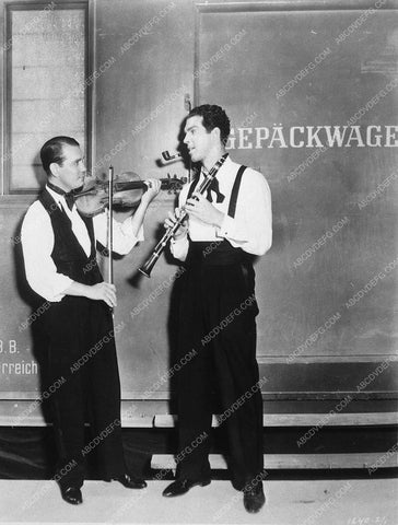 Fred MacMurray playing clarinet 10117-24