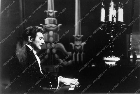 Liberace playing the piano 10265-11