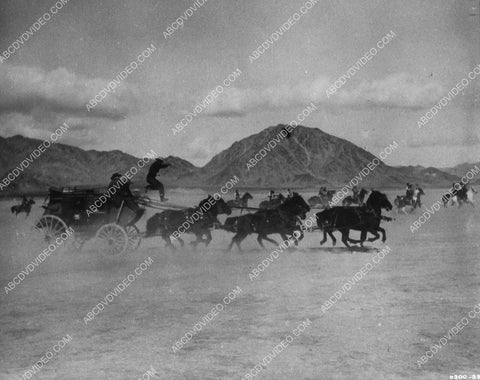Yakima Canutt jumping across the horses classic movie stunt film Stagecoach 1032-01