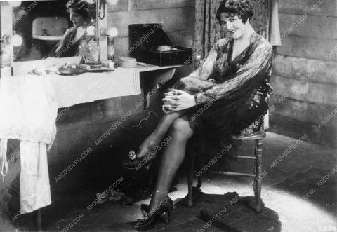 Lina Basquette seated at her makeup table 10390-01