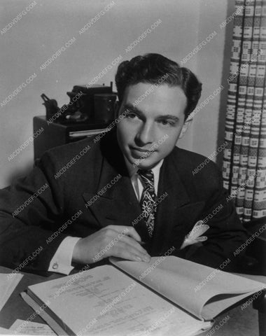 producer Milton Sperling sitting at his desk portrait 10574-36