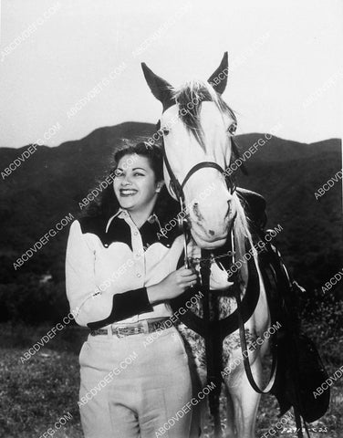 Yvonne De Carlo w her horse film Rainbow Island 10771-12