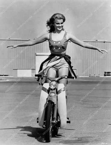 Ann-Margret leggy show-off on Vespa type scooter behind the scenes 1186-21