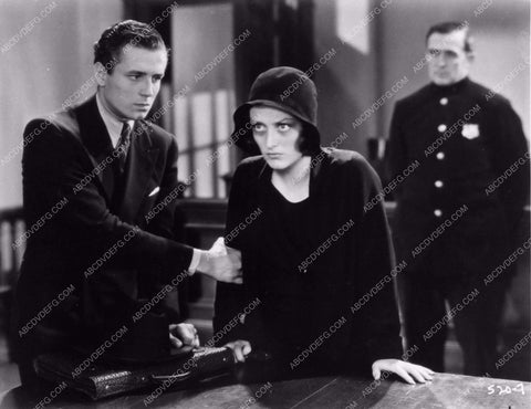 Robert Armstrong Joan Crawford in a scene from Paid photo 1227-32