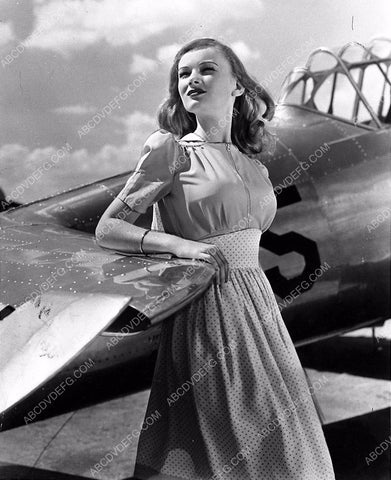 Veronica Lake leaning on the airplane film I Wanted Wings 1249-34