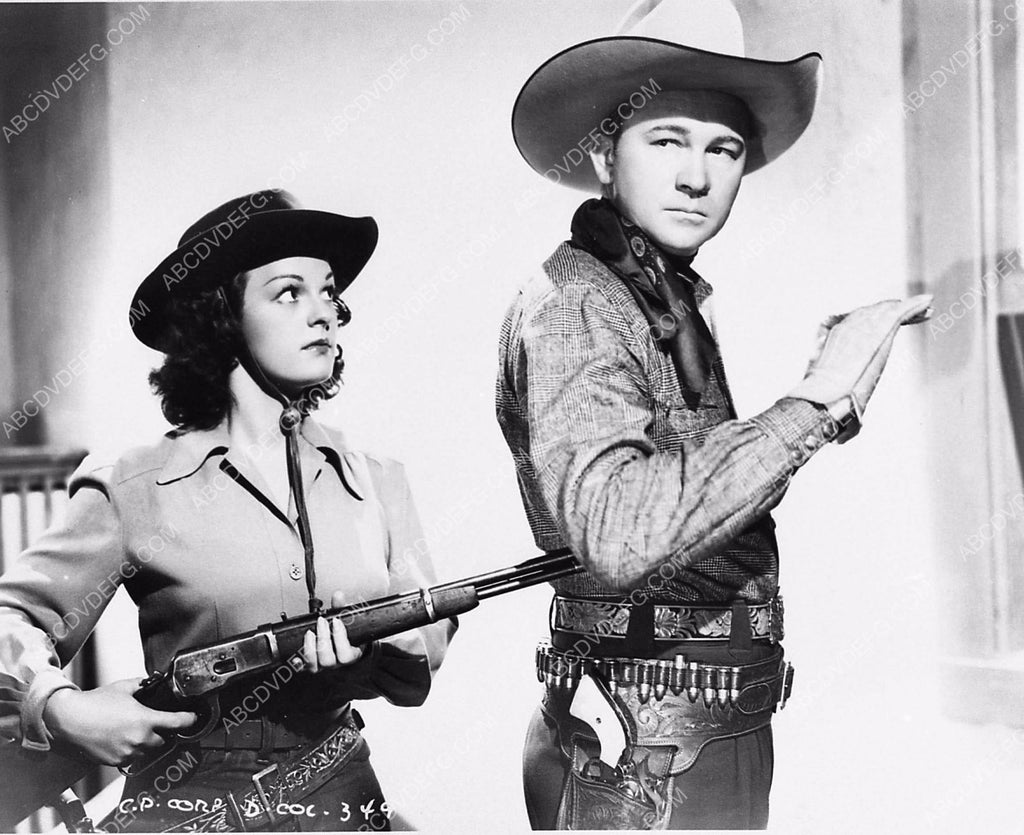 cute cowgirl Dorothy Short holds Tex Ritter at gunpoint film Bullets for  Bandits 1287-08
