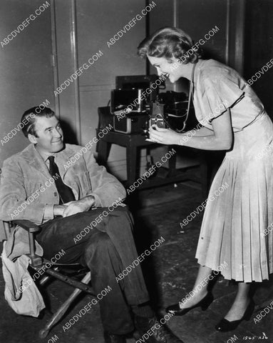 candid Jean Hagen takes James Stewart's picture behind the scenes MGM 1316-22